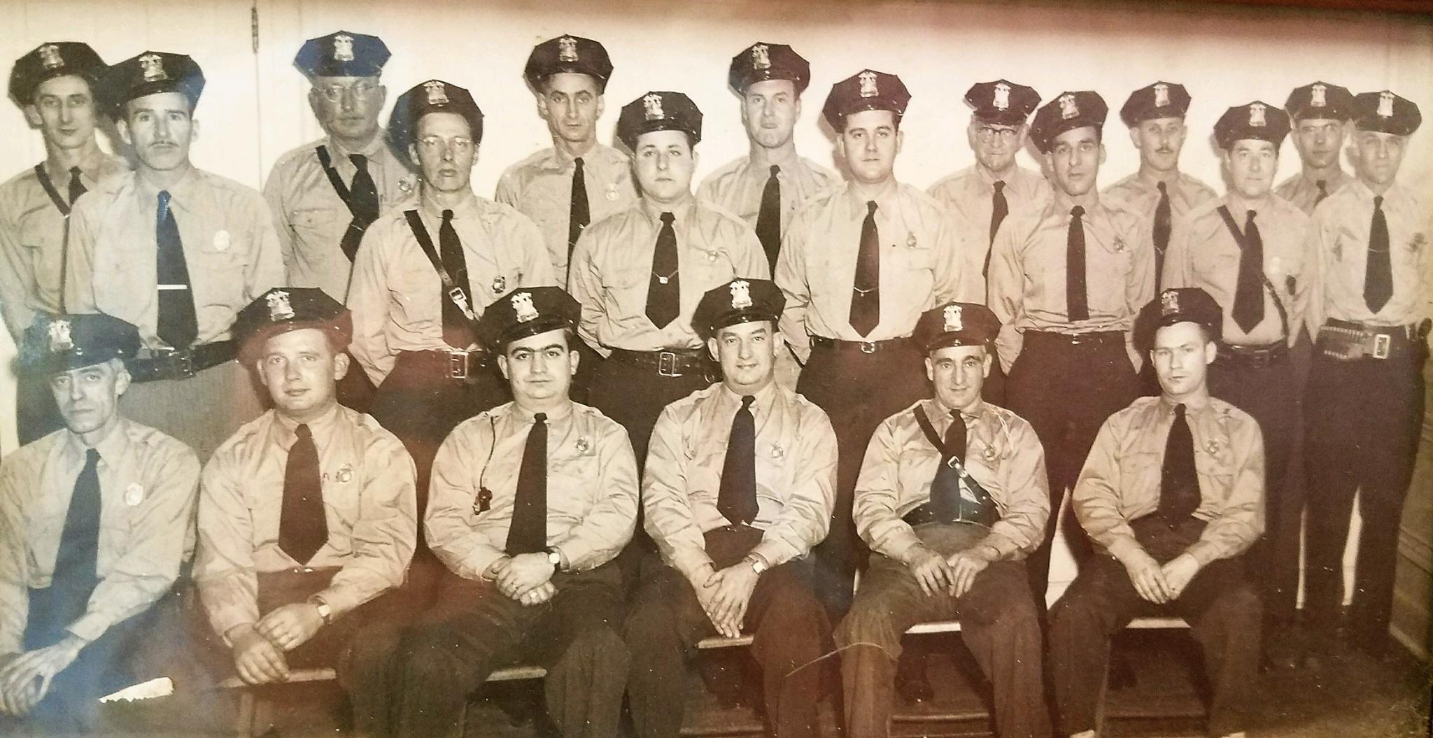Photo provided by Westfield Police Department Officer Barry Meleen Pictured is circa 1960s photo of the Westfield policemen, both regular and auxiliary. Only one is identified, that of Robert Peterson (back row, right end with ammunition belt), Meleen's grandfather, who was police chief for many years until his retirement in 1968.