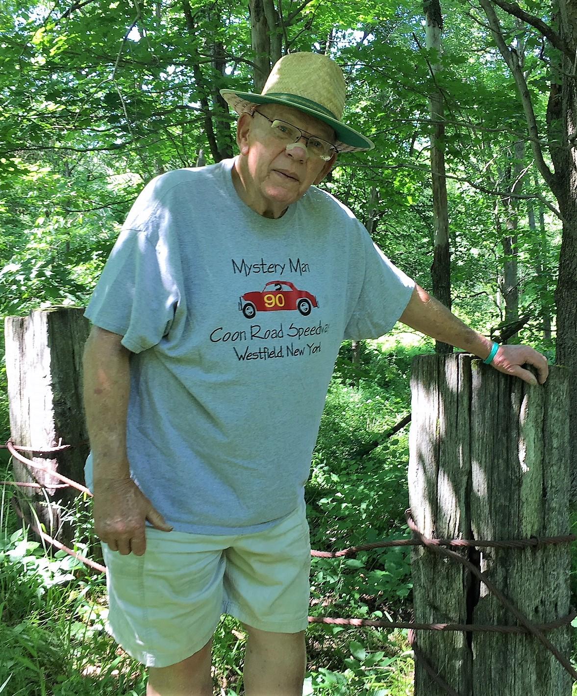 Ken See, the "Mystery Man" of Coon Road Speedway, standing next to one of the original turn three guardrails, at the site of the former race track. Photo taken 7-8-18