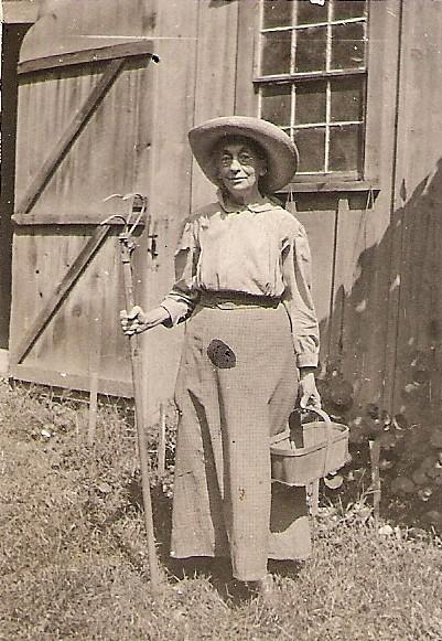 Miss Jennie Macomber circa 1927, as she often appeared when doing her beloved gardening.