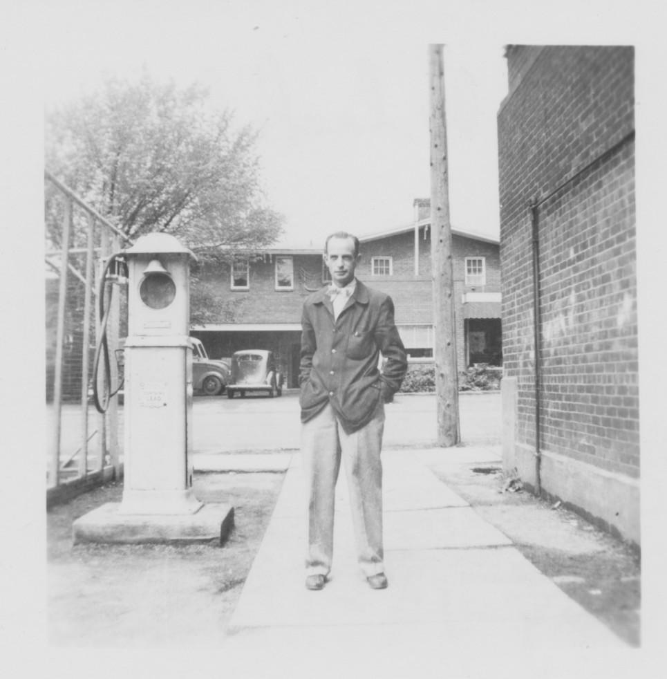 Mr. Blackburn behind the Jr. High Wing of old school (on right), with Vine City Dairy Bar in background. Photo submitted by a 1953, sixth-grade student of Mr. Blackburn.